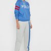 Beiget naisten Ralph Lauren Side-raidalliset lenkkeilyhousut Beiget naisten Ralph Lauren Side-raidalliset lenkkeilyhousut
