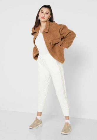 Naisten valkoiset Ralph Lauren korkeavyötäröiset neulotut housut Naisten valkoiset Ralph Lauren korkeavyötäröiset neulotut housut